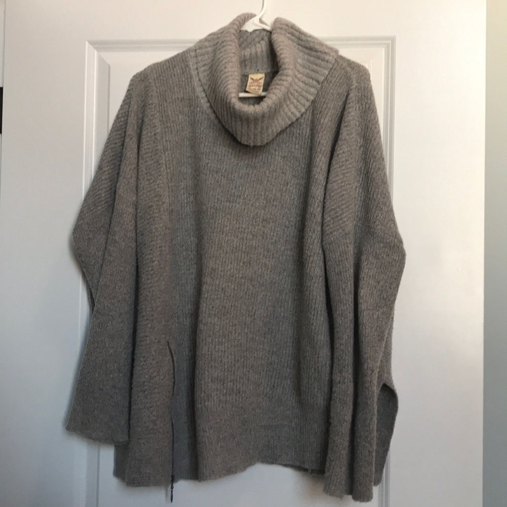 Grey cowl neck sweater with side accent zipper
